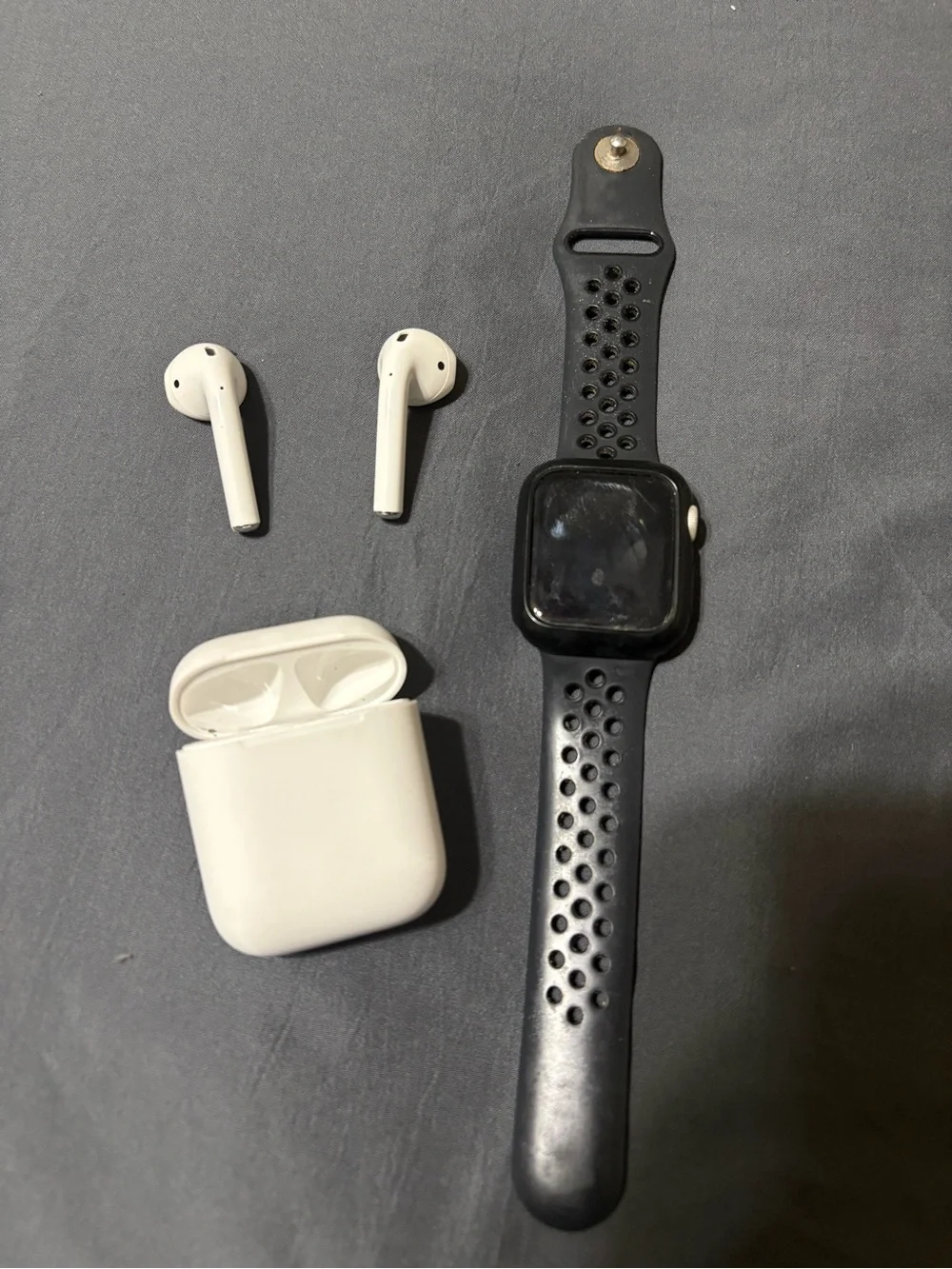 Apple AirPods (White) with Apple Watch Sport Band (Black)